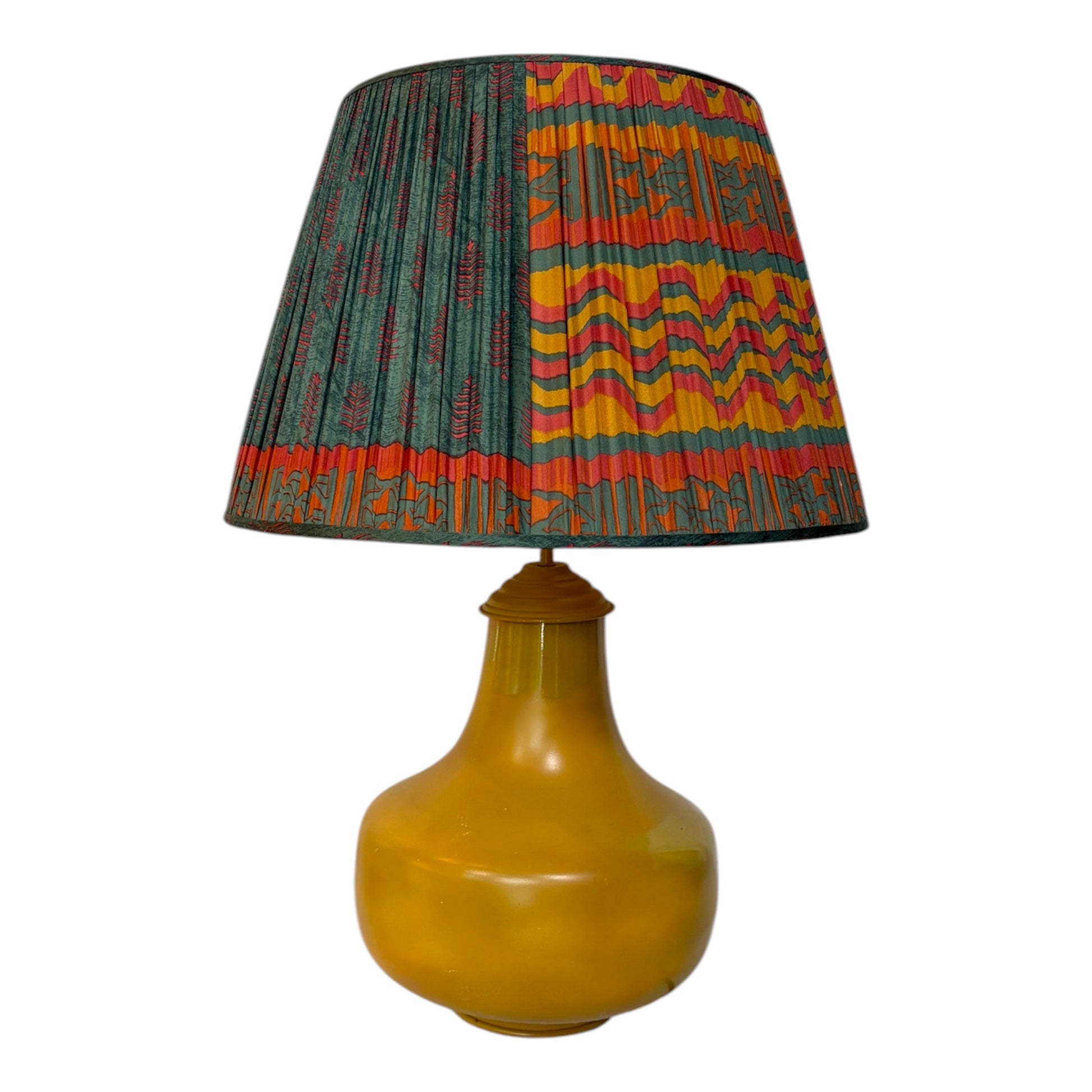 Teal and terracotta silk sari lampshade on a mustard yellow metal lamp base.
