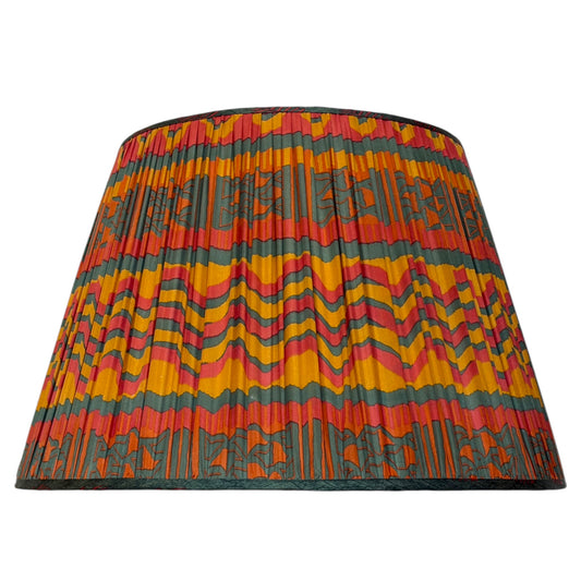 silk lampshade showing ochre geometric pallu. 