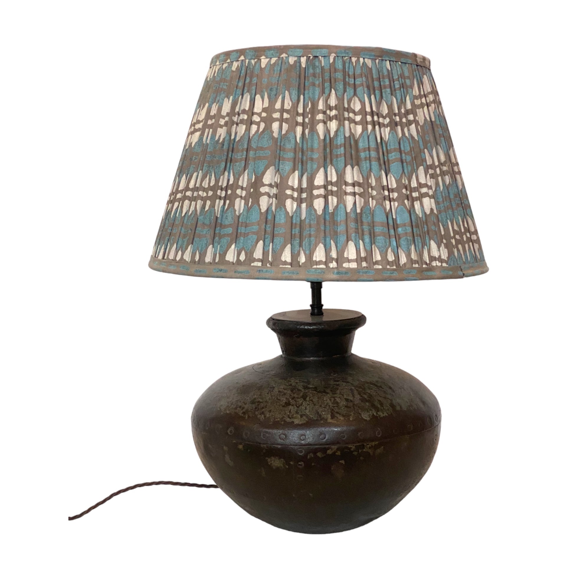 Teal and grey acorn lampshade on Water carrier lamp