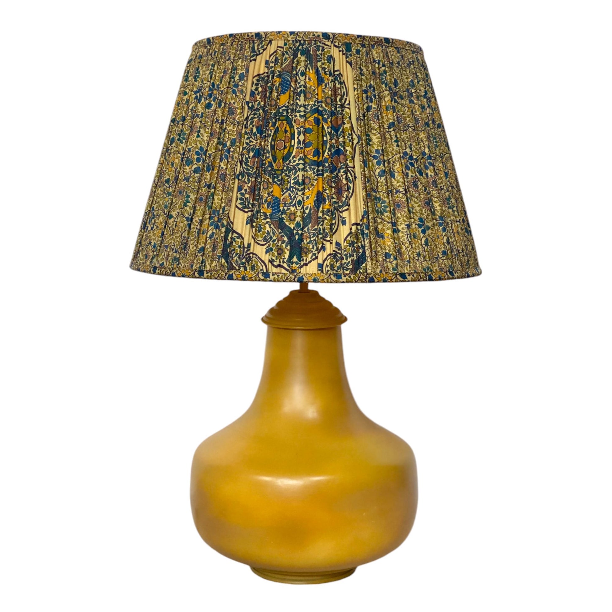 Teal and yellow lampshade on Priyanka lamp base
