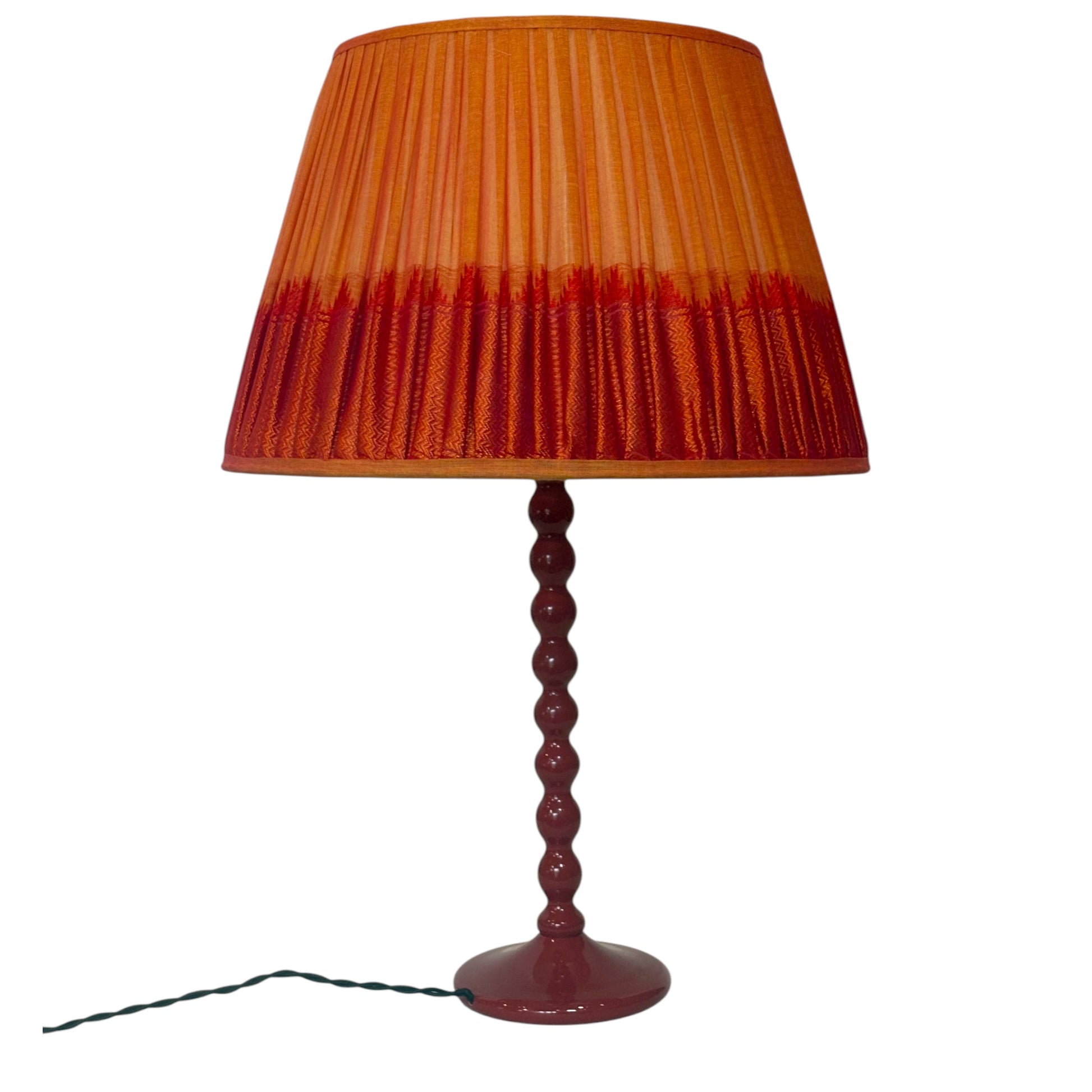 close up tumeric and red cotton lampshade