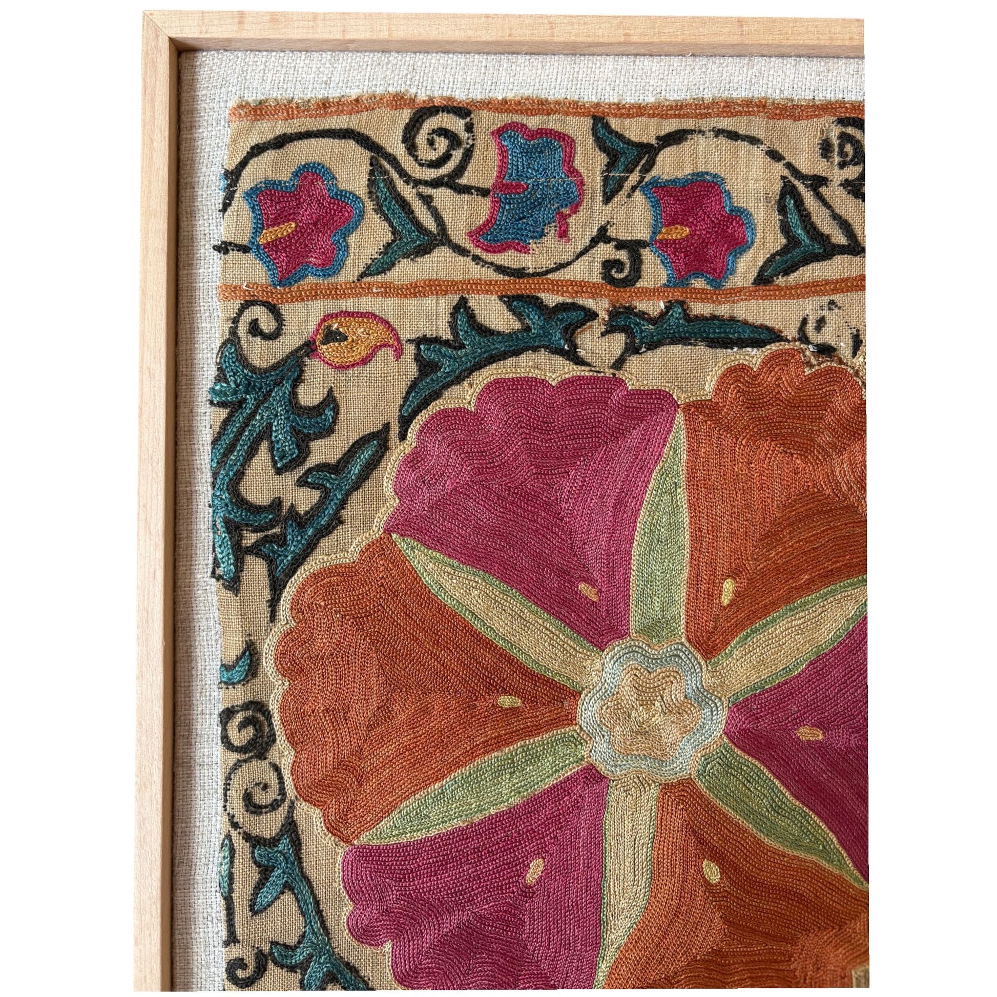 close up suzani fragment framed

