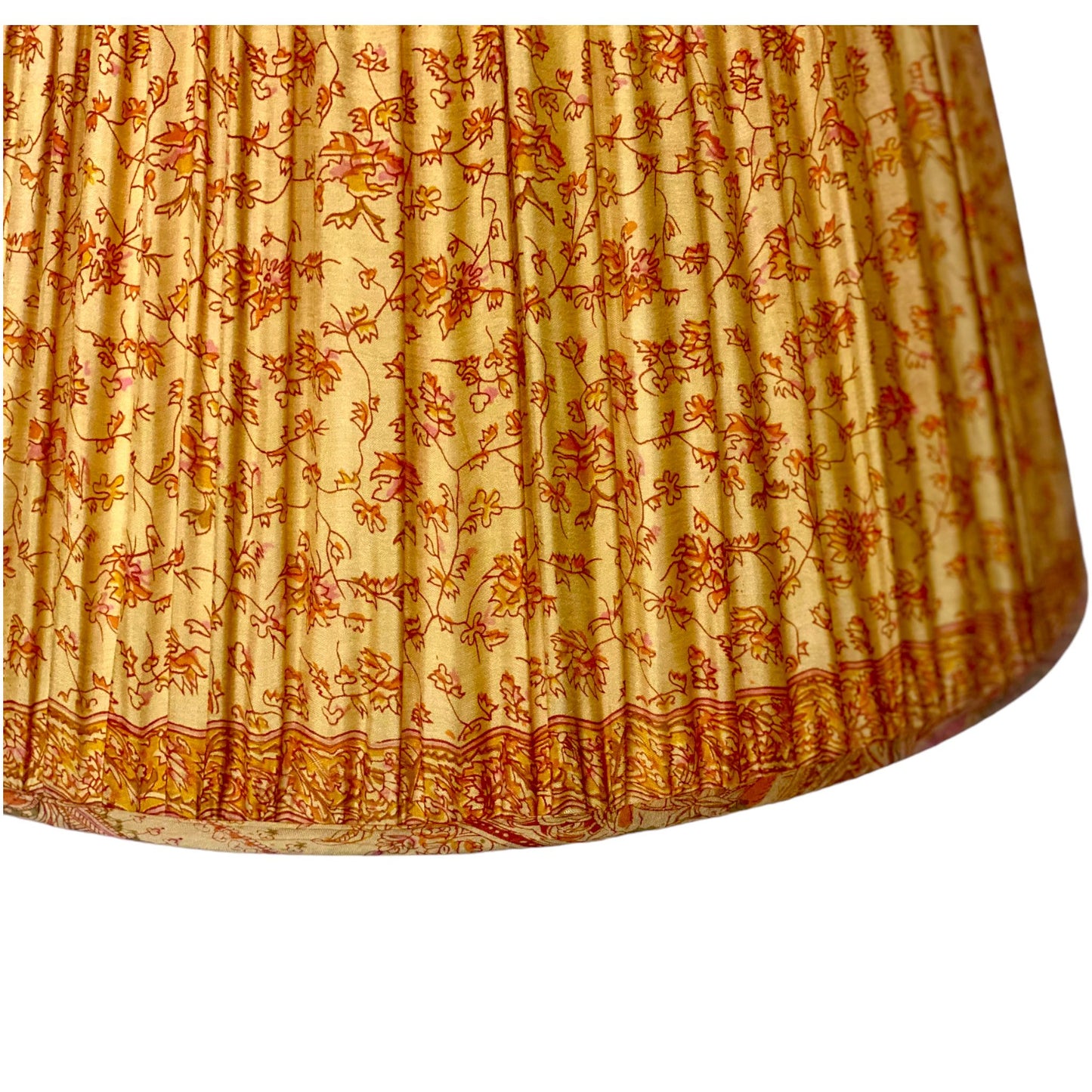 Yellow and pink paisley lampshade close up