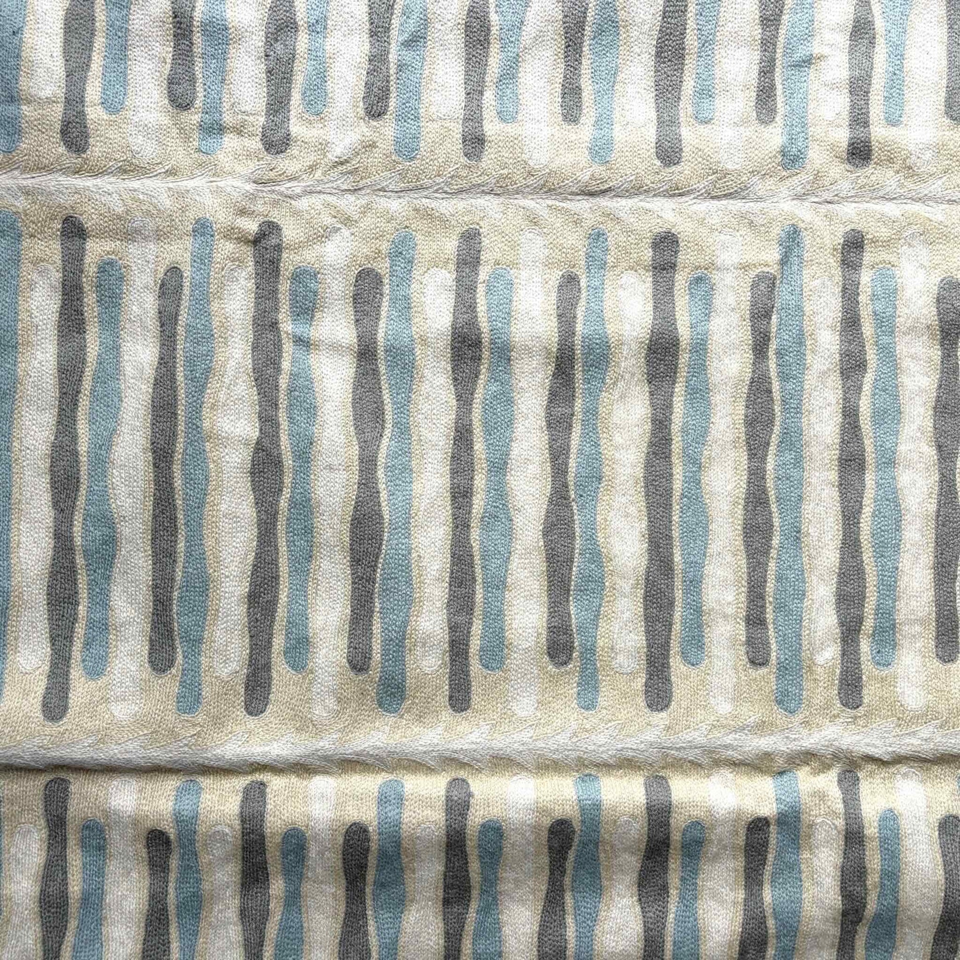 crewel stitched handmade rug