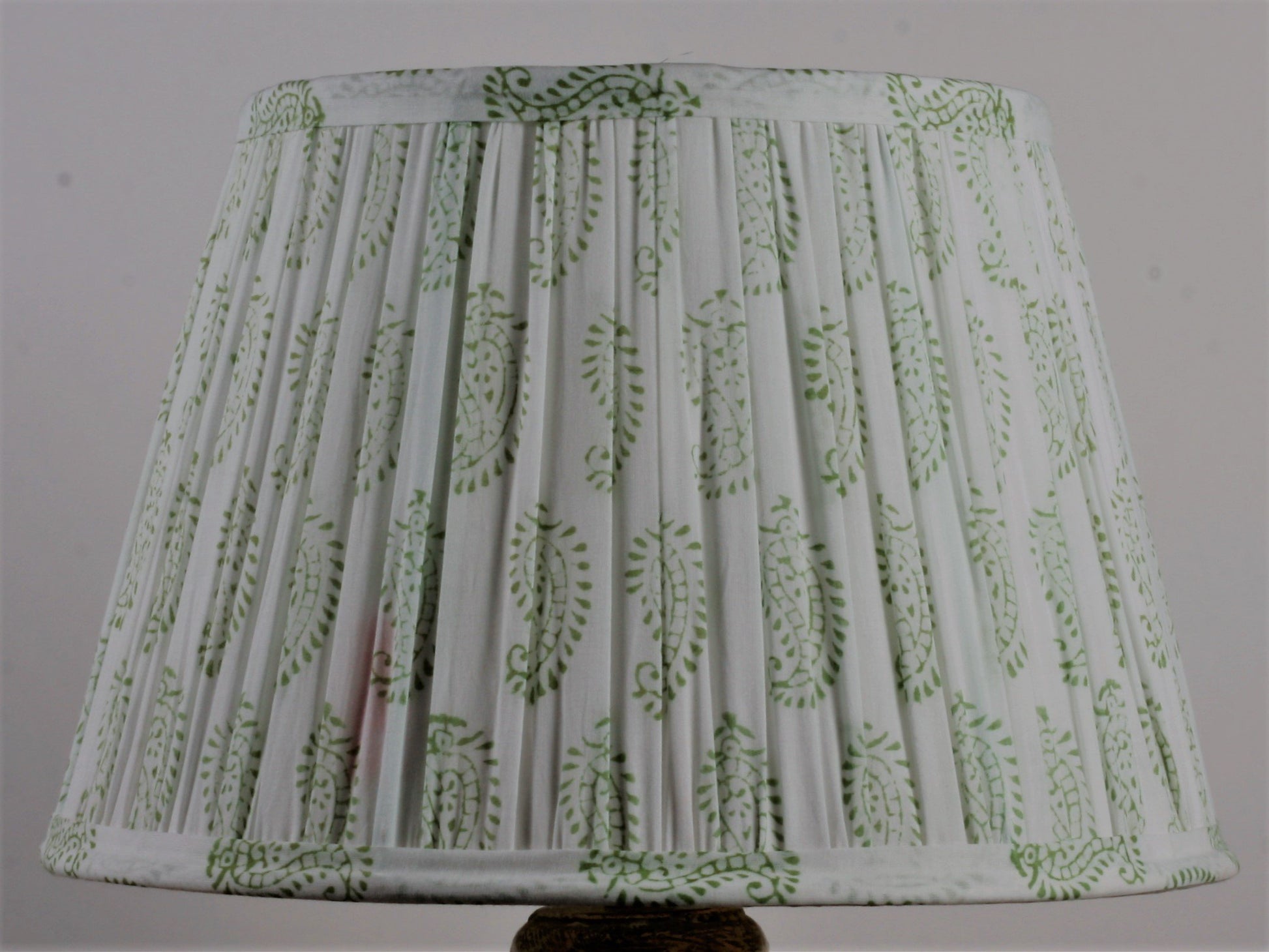 Green and White Cotton Lampshade shown on a light background