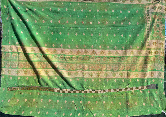 Bright green kantha quilt