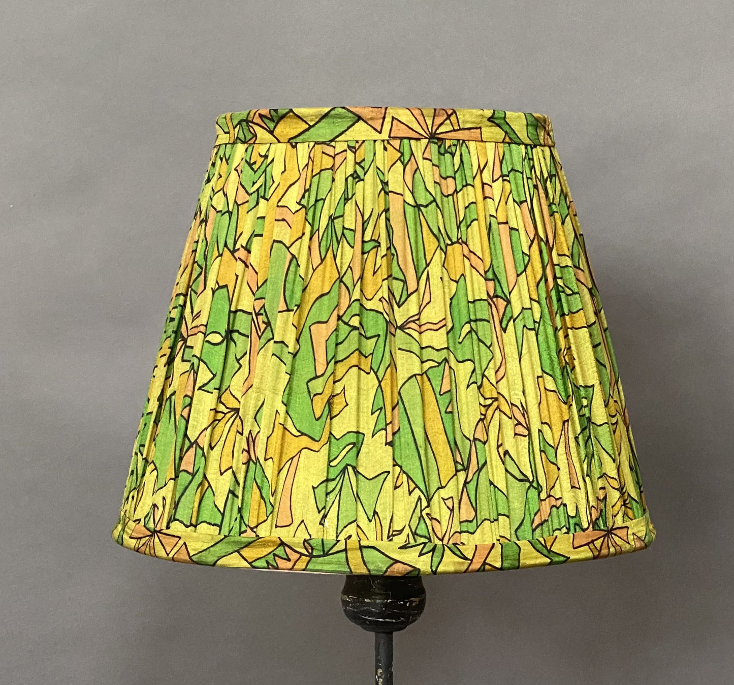 Green & citrine silk lampshade shown on a grey background