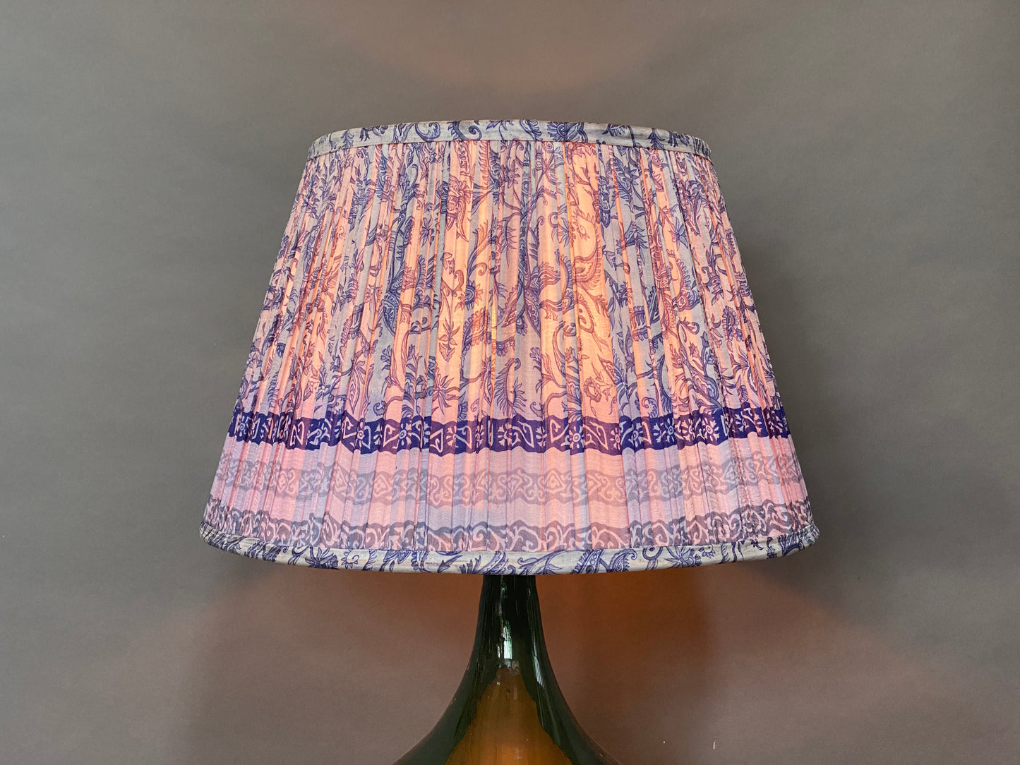 Royal Blue Paisley silk lampshade shown lit