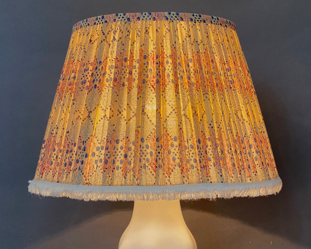 Bagru fringed block print cotton Lampshade with light bulb on