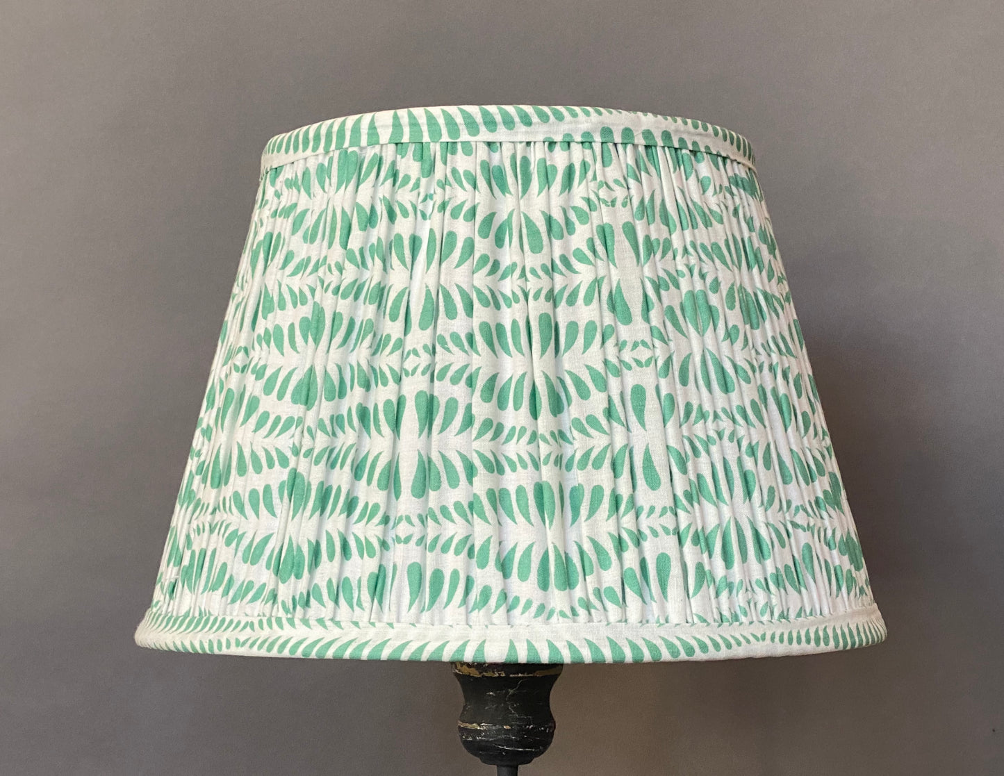 Green Bangla Cotton Lampshade on a grey background