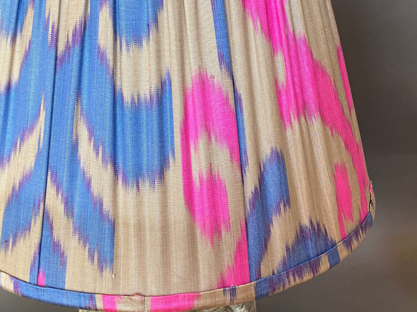 Bright pink and blue ikat silk lampshade close-up