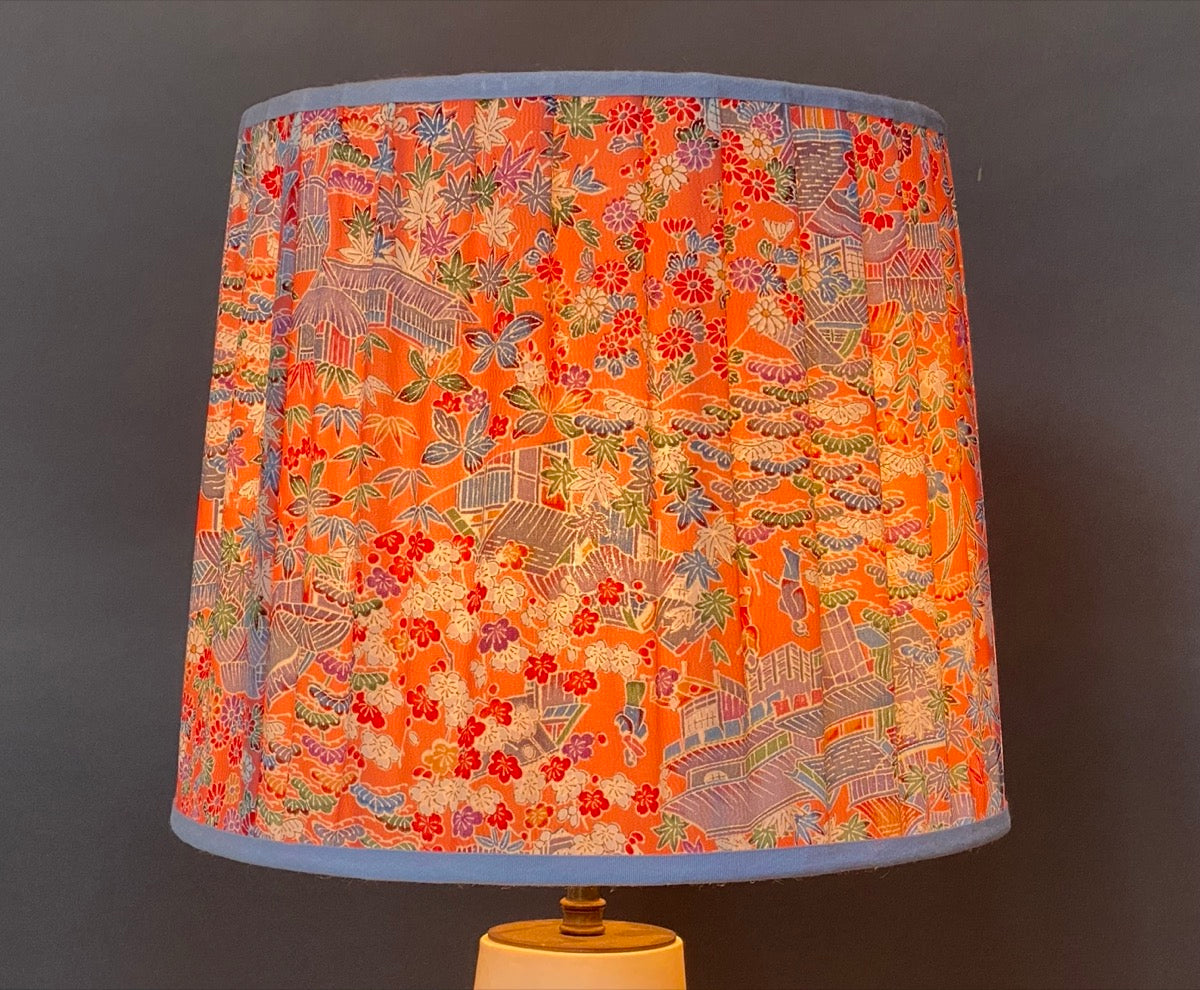 Raspberry and blue patterned silk kimono Lampshade shown lit