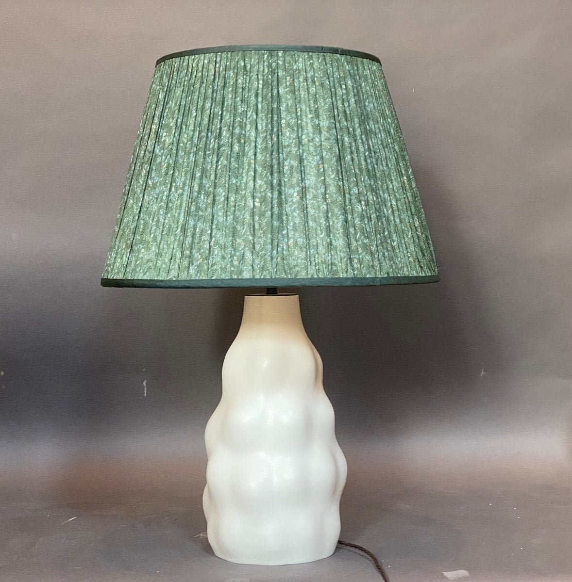 Sea green floral lampshade on lamp
