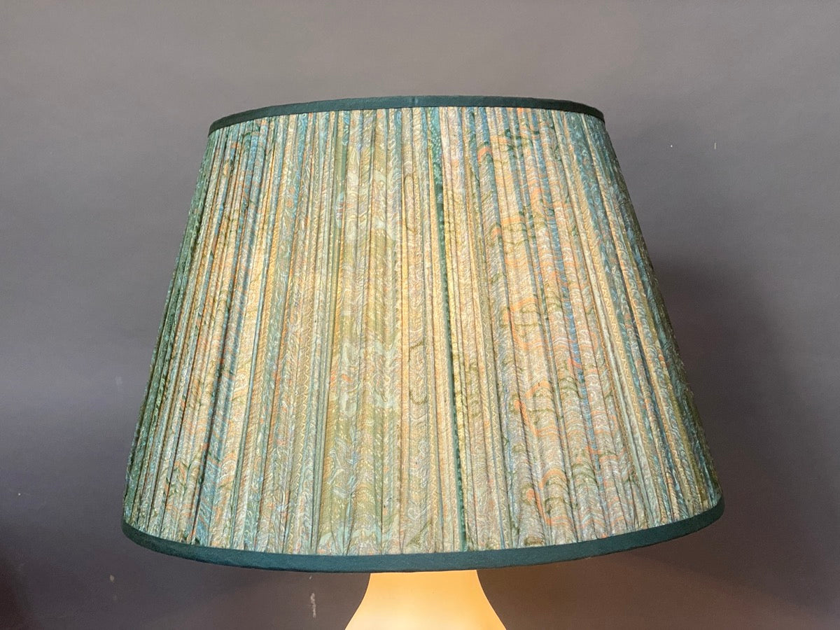 Sea green floral lampshade lit