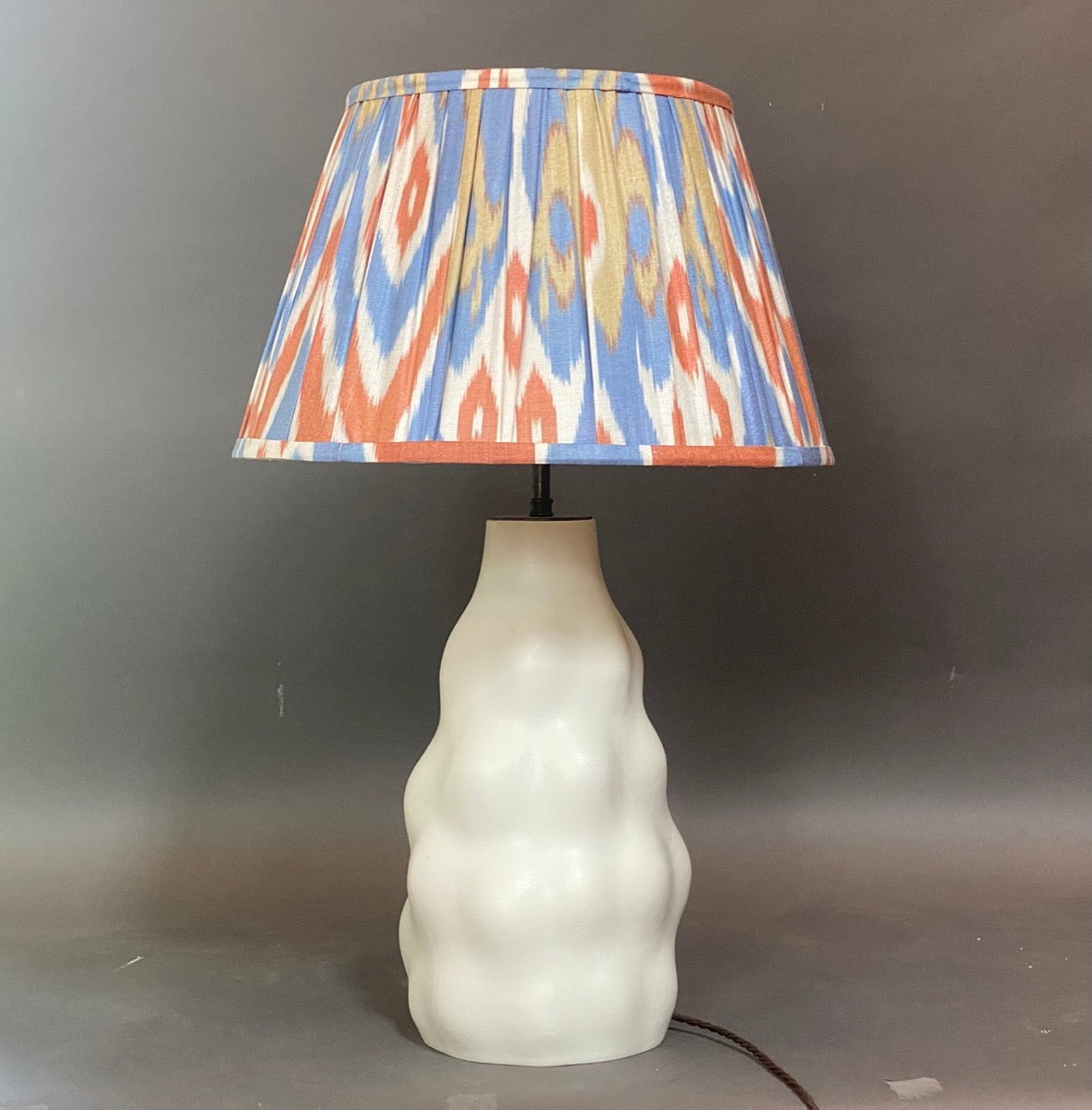 blue orange and yellow ikat lampshade on lamp