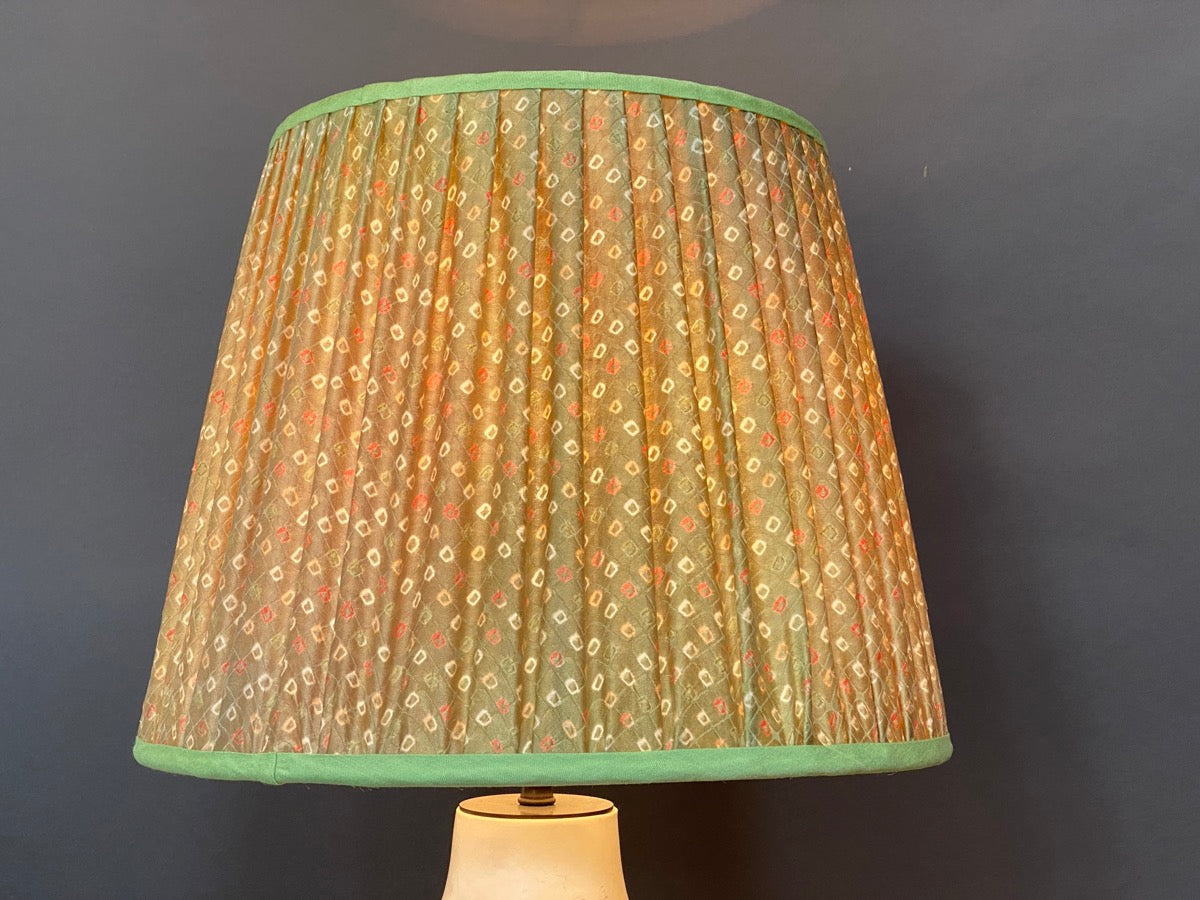 green shibori lampshade lit