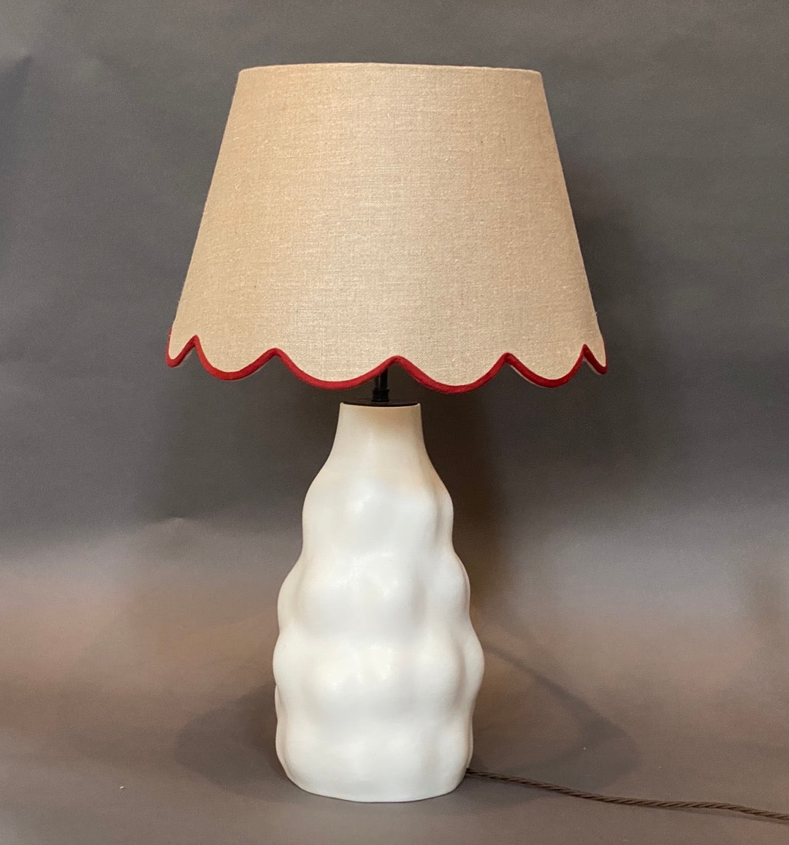 Linen scallop lampshade with red trim