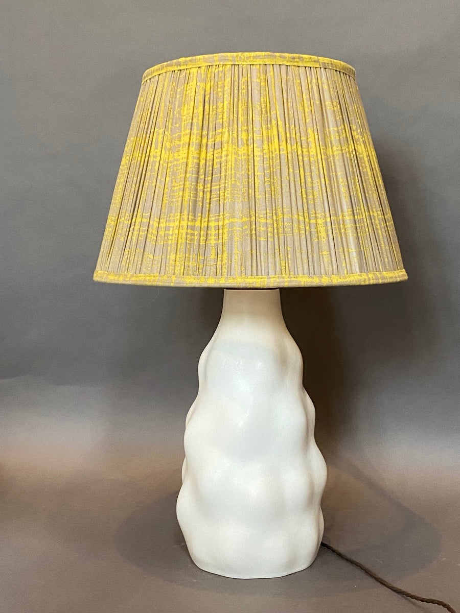 Mustard splatter cotton lampshade on lamp