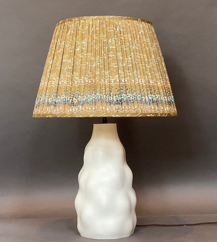 Khaki peacock silk lampshade on an Iki lamp base